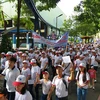胡志明市5千多人参加为橙剂受害者和贫困残疾人步行筹款活动