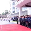 老挝隆重举行东盟旗升旗仪式庆祝东盟成立51周年