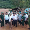 越共中央组织部部长范明正走访慰问清化省洪涝灾害灾民