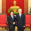 越共中央总书记阮富仲会见老挝党、国家高级代表团