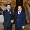 越南政府总理阮春福会见老挝政府总理