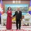 越共中央民运部长张氏梅会见柬埔寨王国国会主席韩桑林