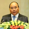 阮春福出席首届中国国际进口博览会：促进越中经贸合作深化升级