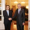 中新两国总理举行会谈 双方签署11项合作备忘录