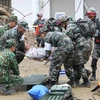 越中边境国防友好交流活动： 越中两军开展灾害救援联合演练活动