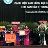 阮氏金银向中央南方局民医委员会授予人民武装力量英雄称号