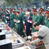 平福省举行在柬埔寨牺牲的越南烈士遗骸安葬仪式