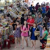 帮助岘港市商贩提高外语能力