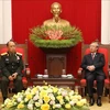 越共中央书记处常务书记陈国旺会见老挝人民军高级政治代表团