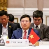 越南政府副总理兼外长范平明出席东盟外长会议