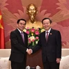 国会副主席冯国显会见老挝国会代表团