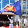 老挝举行东盟会旗升旗仪式 庆祝东盟成立52周年