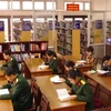 越南与老挝加强军队图书馆的合作