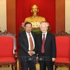越共中央总书记、国家主席阮富仲会见老挝国家主席本扬·沃拉吉