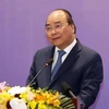 越南政府总理阮春福：以企业为发展动力