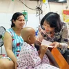 越南国家领导人春节走访慰问癌症患者和贫困劳动者