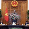 越南政府总理：人民群众应对政府抗击COVID-19疫情给予信心与支持