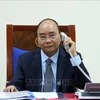 越南政府总理阮春福与俄罗斯总理米舒斯京通电话