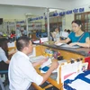  提升越南社会保险在社会保障中的地位和作用