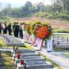 承天顺化省为15具在老挝牺牲的越南烈士遗骸举行追悼会和安葬仪式