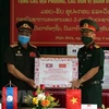 广义省向老挝占巴塞省提供防疫医疗物资援助