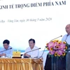 政府总理阮春福主持越南南部重点经济区各省市人民委员会领导人工作会议