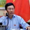 越南政府副总理兼外交部长范平明与埃及外交部长通电话