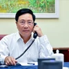 政府副总理兼外长范平明与韩国外交部长康京和通电话