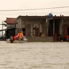越南中部遭遇严重暴雨洪涝灾害 多地淹没在洪水之中