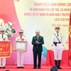 越南政府总理阮春福向公安部安全调查局授予人民武装力量英雄称号
