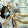 越南外交部例行记者会：超过3.5万名越南人获得新冠疫苗接种