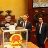 第十四届越南国会第十一次会议新闻公报（第六号）