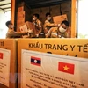 《万象时报》深度报道越南在抗疫斗争中对老挝所给予的宝贵援助