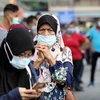 马来西亚批准新冠疫苗紧急使用 老挝要求密切接触者必须在指定隔离区接受隔离