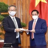 越南政府总理范明政会见日本驻越南大使山田贵雄