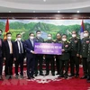 老挝国防部向越南新冠疫苗基金捐赠20万美元