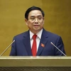 越南第十五届国会第一次会议：政府总理范明政：主动破除体制机制障碍