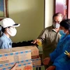 向旅居柬埔寨西哈努克省越南人送上慰问品 助力渡过疫情难关