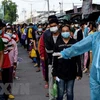 新冠肺炎疫情：柬埔寨担忧从泰国返回的大量劳动者时新冠患者将快速增加