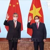越南政府总理范明政会见中国国务委员、外交部长王毅