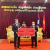 首都河内捐赠款项支持老挝琅勃拉邦省抗击疫情