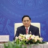 范明政会见出席第十六届东亚峰会的各国驻越南大使和临时代办