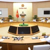 越南政府总理范明政主持召开2021年10月政府例行会议