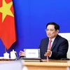 越南政府总理范明政就加强亚欧各国合作提出四项建议