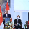 越南国家主席阮春福与瑞士联邦主席居伊·帕默林共同主持越瑞企业家论坛