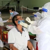 11月30日越南62个省市新增新冠肺炎确诊病例近1.4万例
