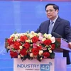范明政总理：越南确定人类既是发展的中心、主体又是发展的动力和目标