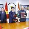 越南国会办公厅与印度下议院办公厅签署图书馆与电视领域的合作备忘录