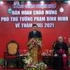 越南政府常务副总理范平明圣诞节前夕走访慰问承天顺化省天主教信教群众