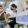 老挝自2022年1月起试点开学复课 菲律宾批准为5 - 11 岁儿童接种新冠疫苗